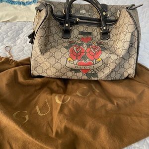 6 designer handbags- Gucci, Burberry, Tory Burch, and 3 Marc Jacobs bags